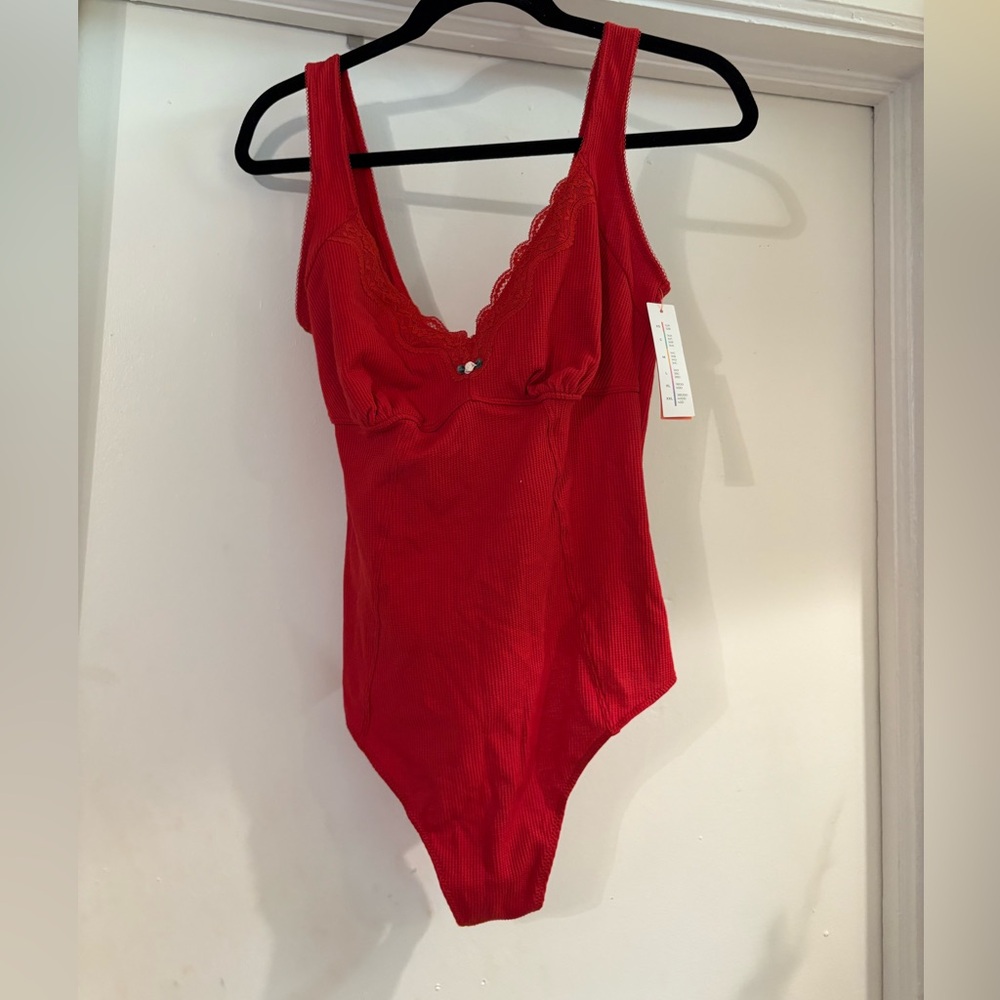 NWT red bodysuit with rose